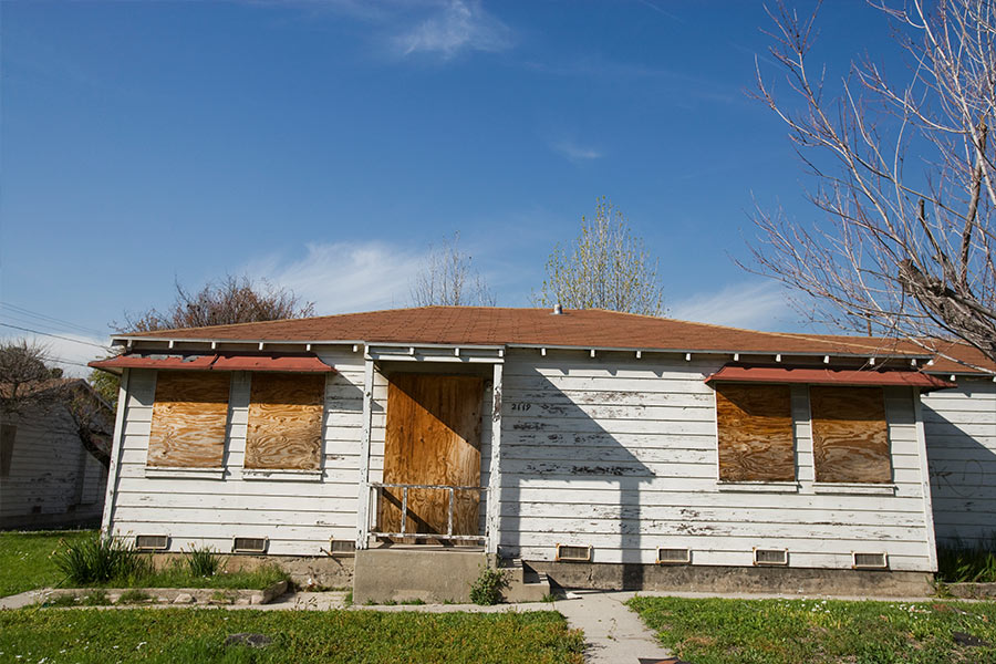 Boarded up home in Fairfax, VA, after abandoned property cleanout services